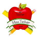 Red apple with teacher-themed decorations on a white background