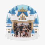 Castle-shaped photo frame with a family picture inside, set against a white background