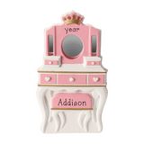 Pink and white vanity with mirror, hearts, and a crown on a white background