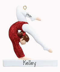 Gymnast in a glittery red leotard,  on a balance beam