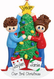 COUPLE DECORATING CHRISTMAS TREE Ornament